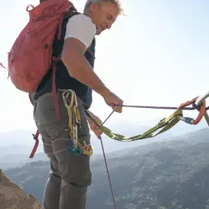 Man climbing with ropes